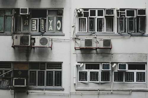 hong kong white window-type air conditioner on wall balcony